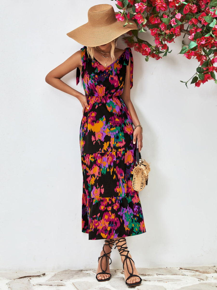 Tie-strap abstract print tiered maxi dress with a V-neck.