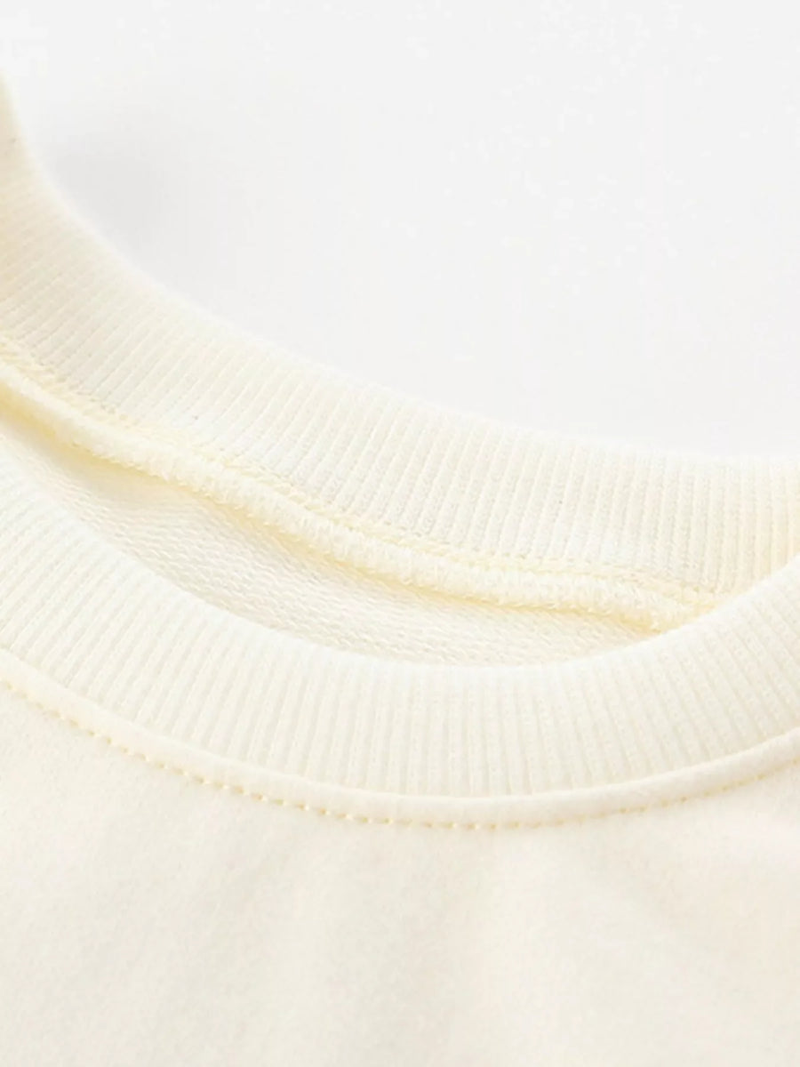 Children's cream crew neck sweatshirt with ribbed collar detail