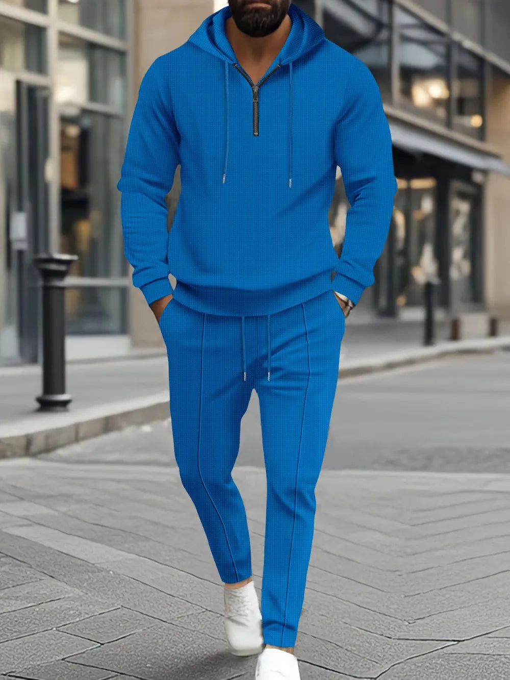 Blue textured quarter-zip hoodie and matching lounge pants set with drawstring details.
