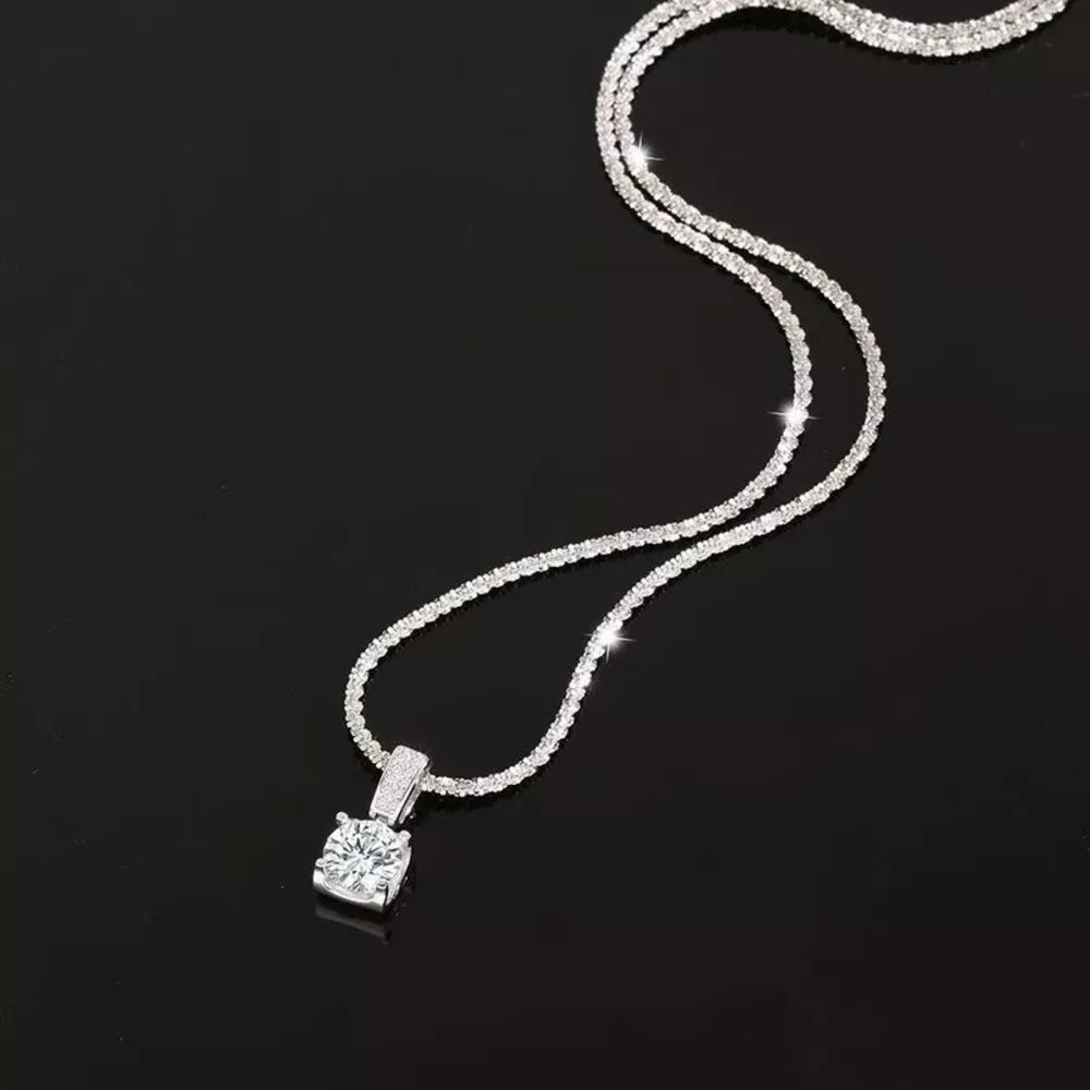 925 sterling silver,Moissanite Carat weight: 1ct Care instructions: Avoid wearin necklace in clear with fitted silhouette