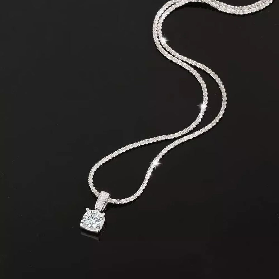 925 sterling silver,Moissanite Carat weight: 1ct Care instructions: Avoid wearin necklace in clear with fitted silhouette