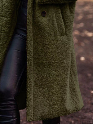 Army green teddy bear longline coat with button detail and pocket.