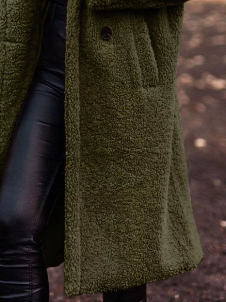 Army green teddy bear longline coat with button detail and pocket.