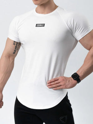 White performance raglan tee with black logo detail and curved hem