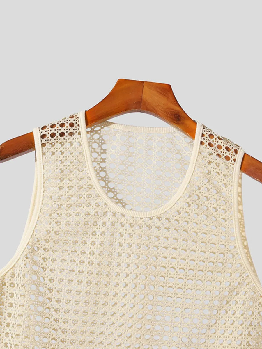 Beige open knit tank top with a round neckline and crochet-like pattern.