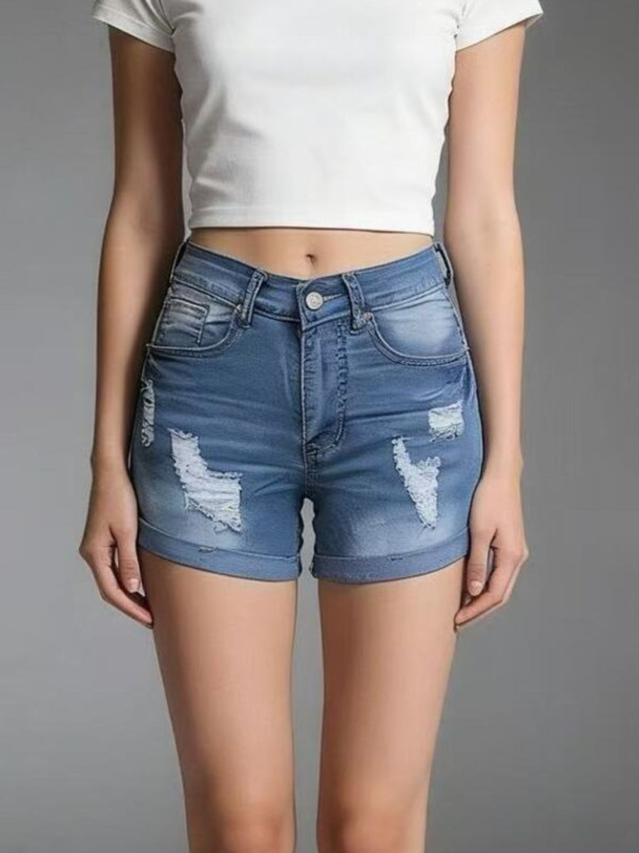 Light blue distressed denim shorts with cuffed hem and button closure