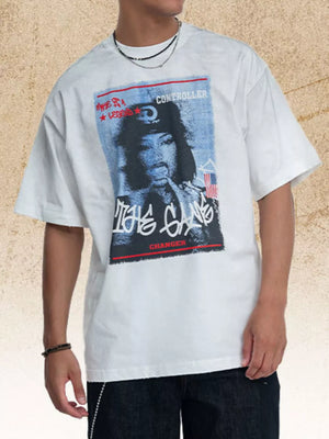 White graphic t-shirt with short sleeves and a crew neck featuring a portrait and text print.