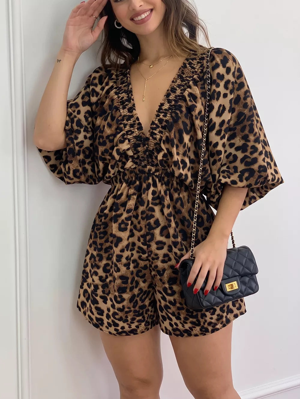 tan romper with leopard-print and v-neck
