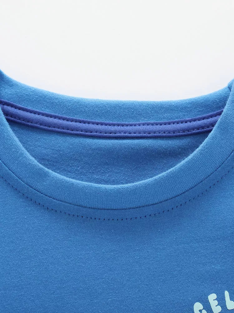 Blue cotton blend toddler t-shirt with contrast trim neckline and graphic detail.