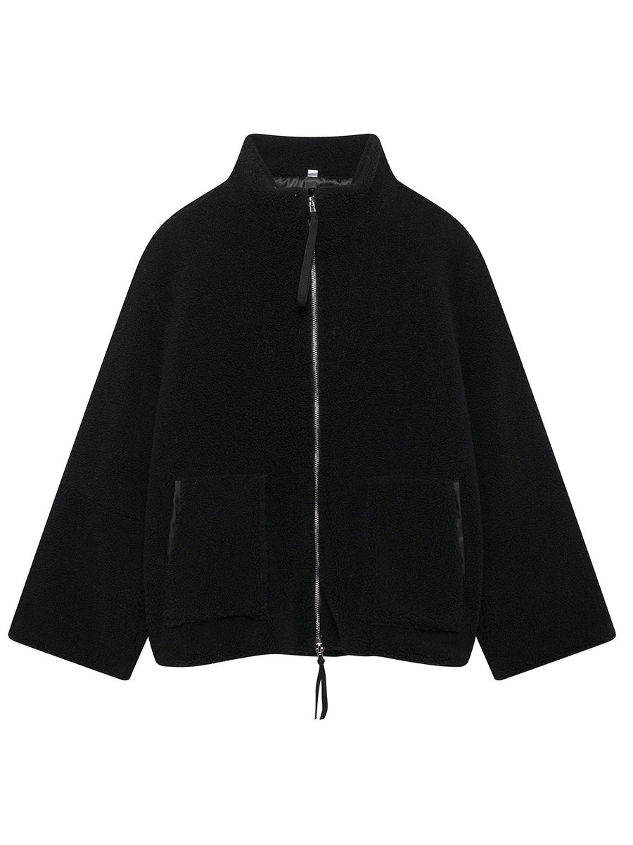 Black sherpa jacket with stand collar, zip front, and two front pockets.
