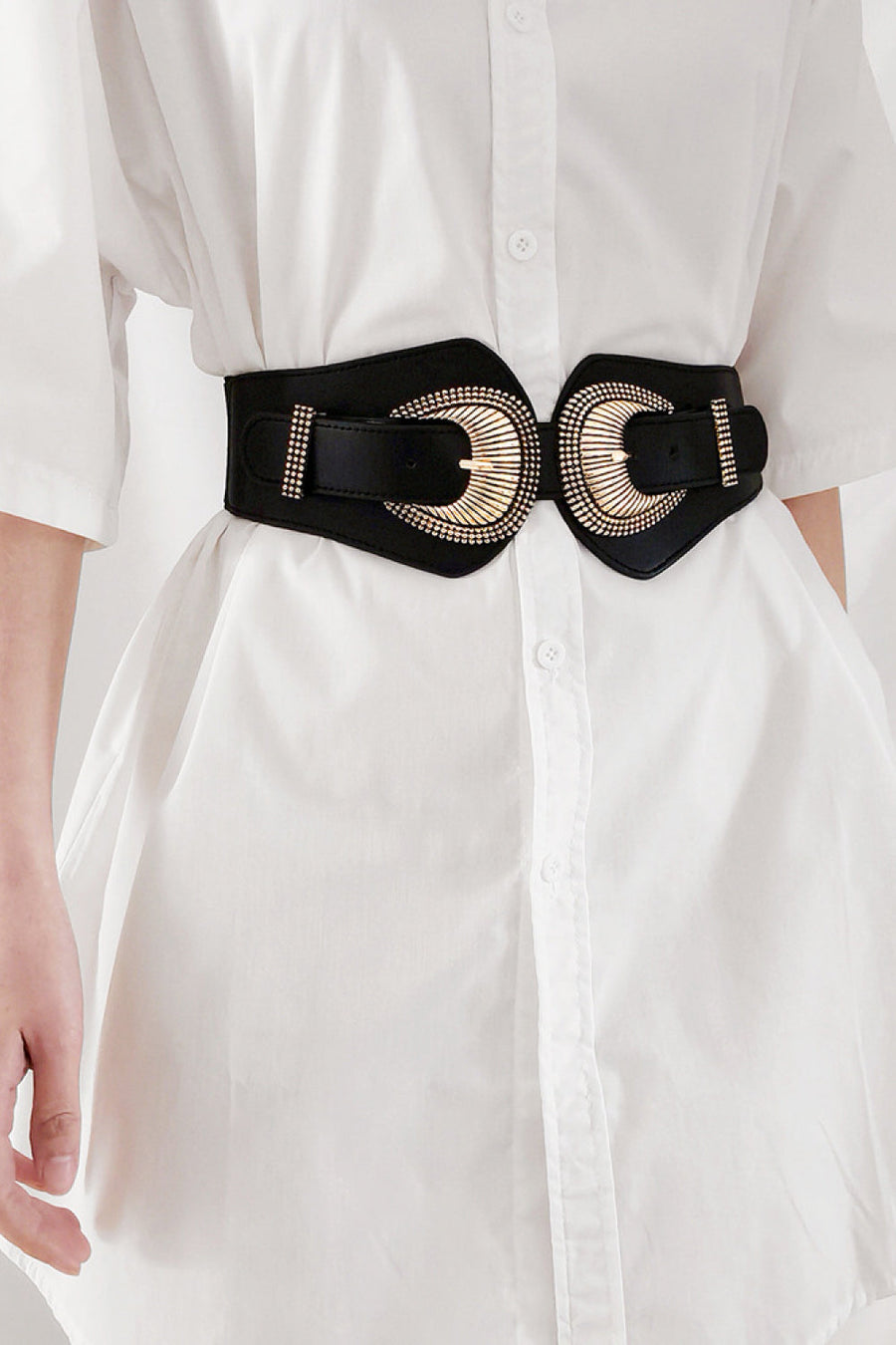 Black elastic corset belt with sculpted gold double buckle and stud detail