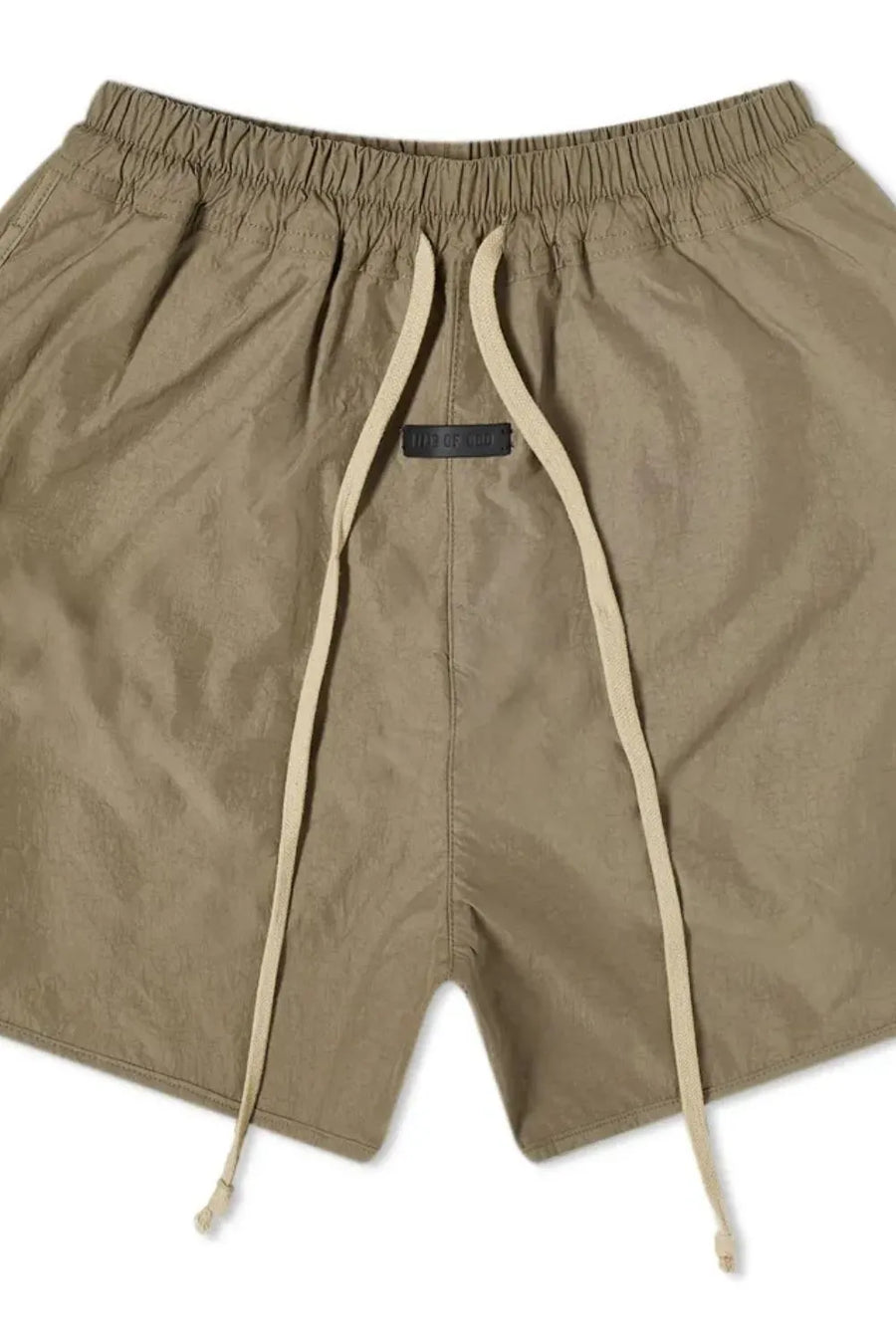 Taupe nylon drawstring shorts with curved hem and black logo tag.
