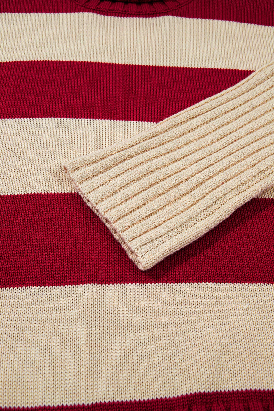 pullover sweater in burgundy with ribbed trim and hip-length