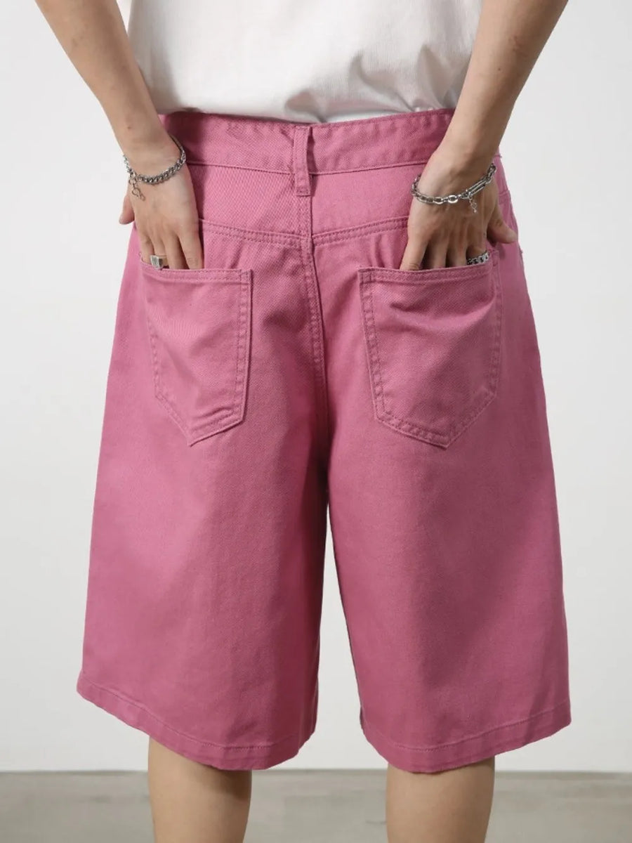 Pleated Bermuda shorts in Moonlit Mauve with buttoned closure and back pockets.