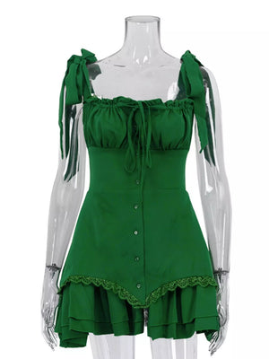 Green tie-strap mini dress with lace trim and button front