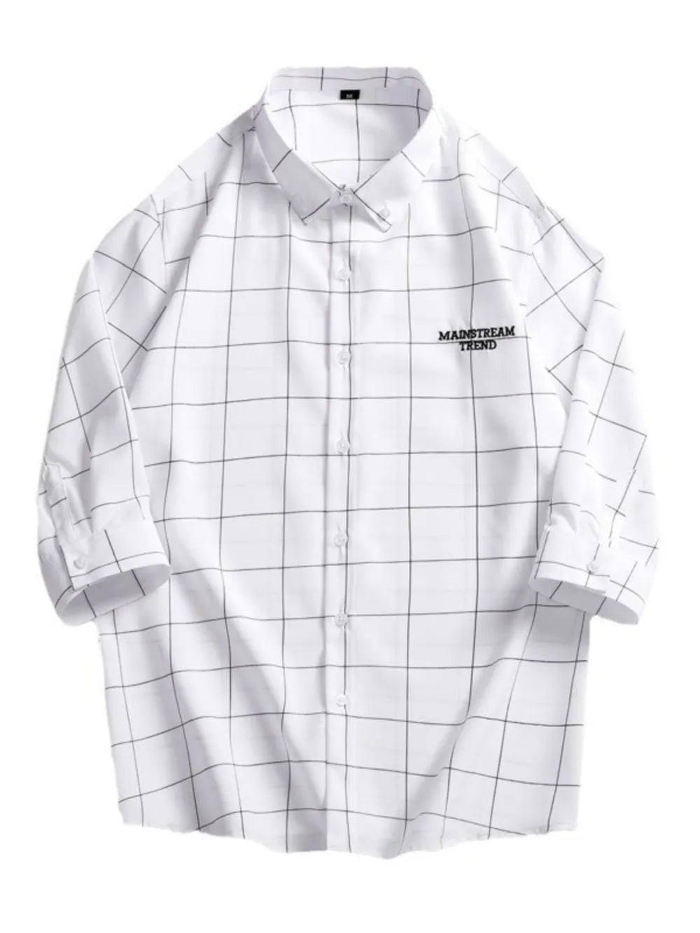 White oversized button-down shirt with black plaid print and embroidered text detail.