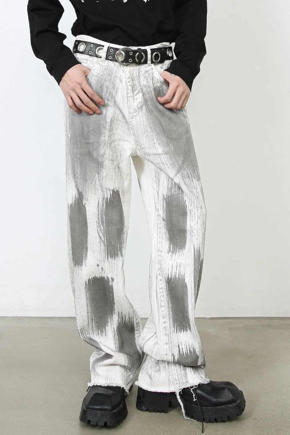 Brushstroke denim jeans in light with wide leg and raw hem