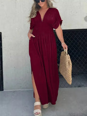 Burgundy V-neck maxi dress with dolman sleeves, smocked waist, and side slits.