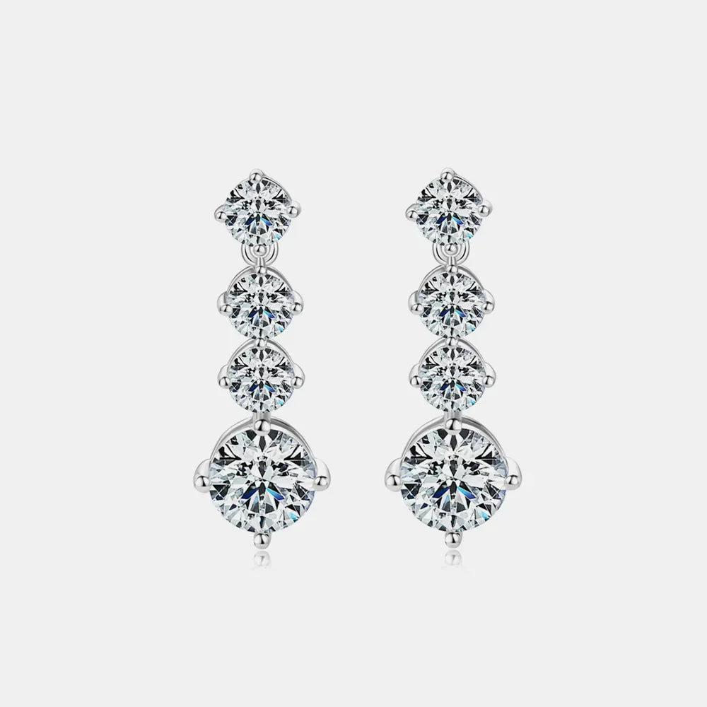 Silver cascade drop earrings with cubic zirconia stones.
