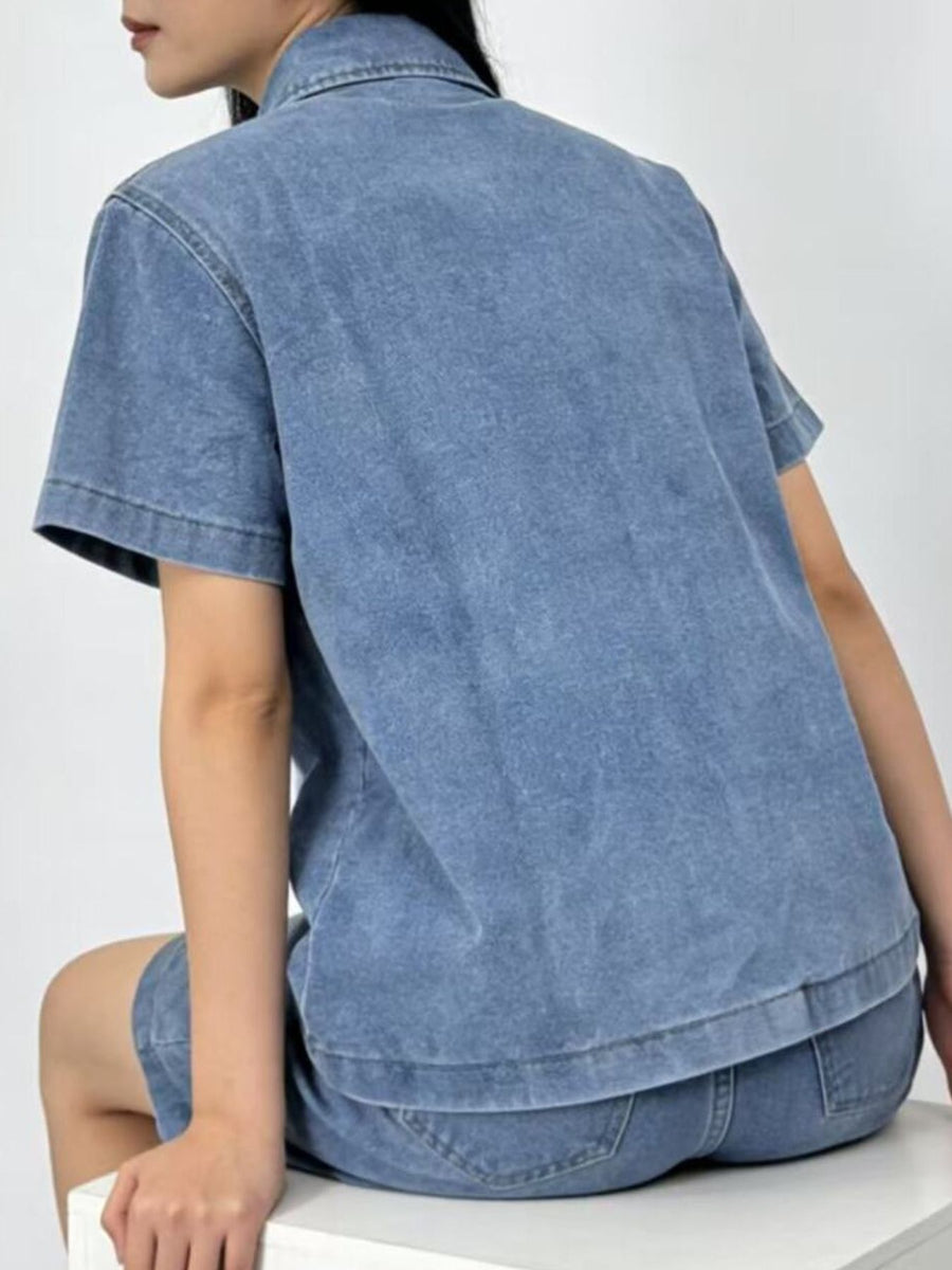 Button-up denim top and shorts set in sky blue, collared, short-sleeve, casual cotton.