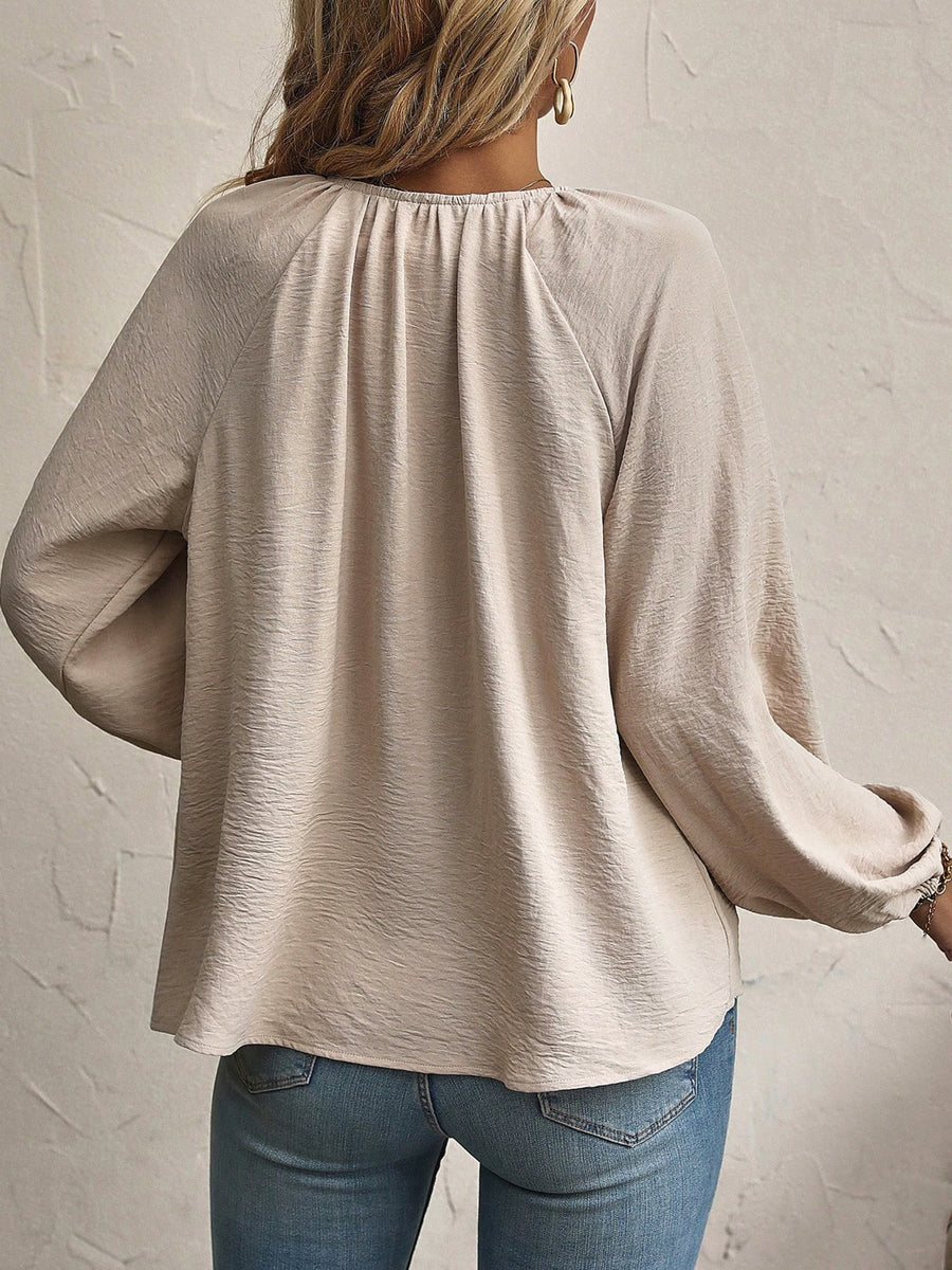 beige blouse with tie-front and long sleeve