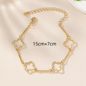 Gold dainty four leaf clover charm bracelet with adjustable chain
