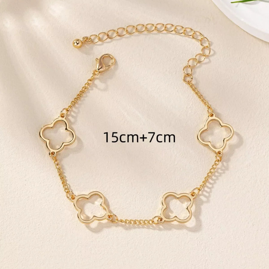 Gold dainty four leaf clover charm bracelet with adjustable chain