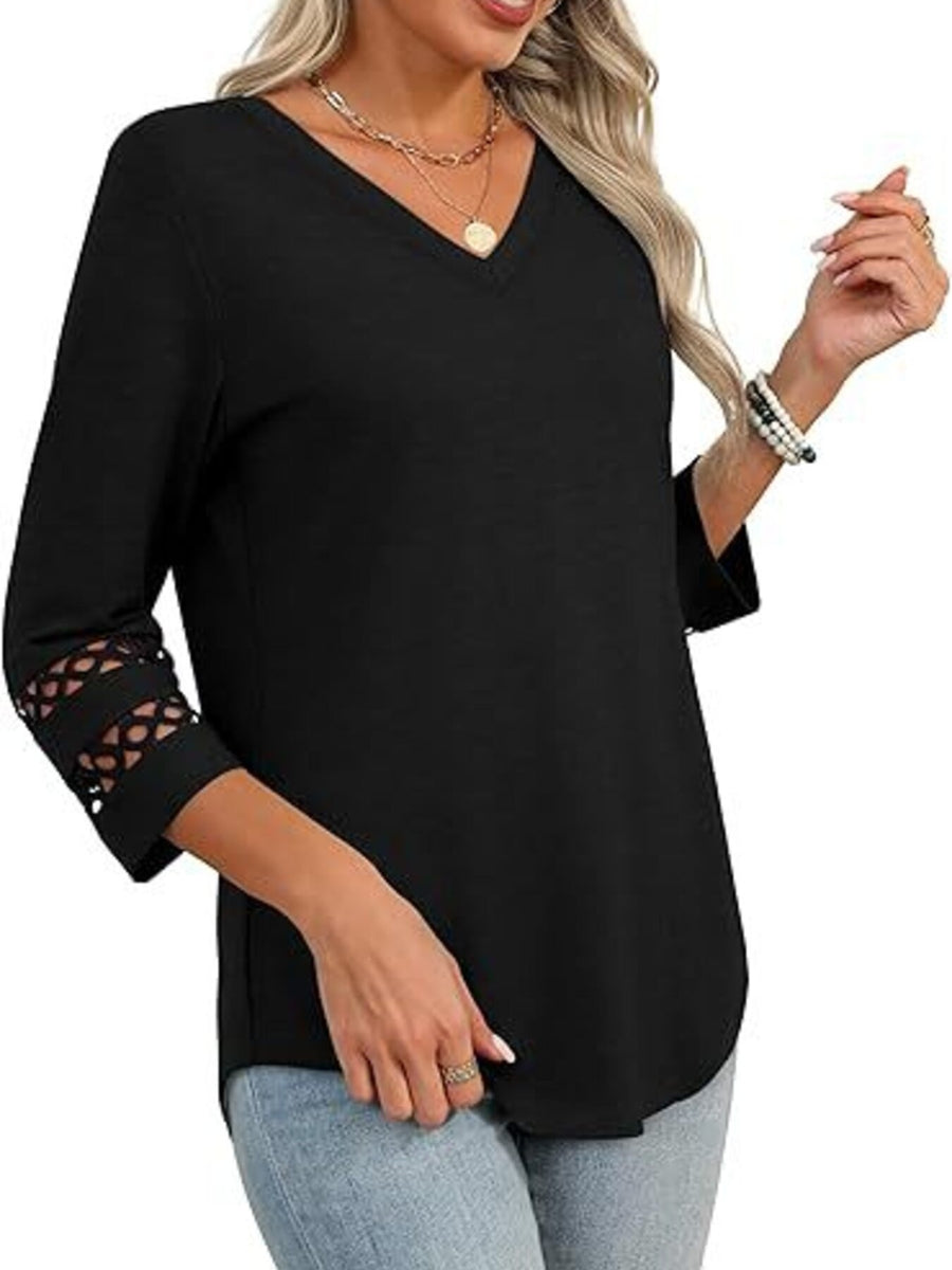 Black 3/4 sleeve t-shirt with V-neck and cutout detail on sleeves.