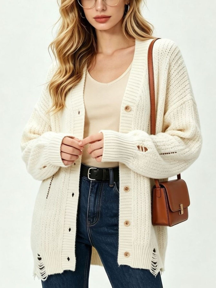 100% polyester Care instructions: Machine wash cold cardigan in Black with oversized silhouette