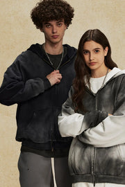 Ombre washed zip-up hoodie in black and white, featuring a relaxed fit and distressed details.