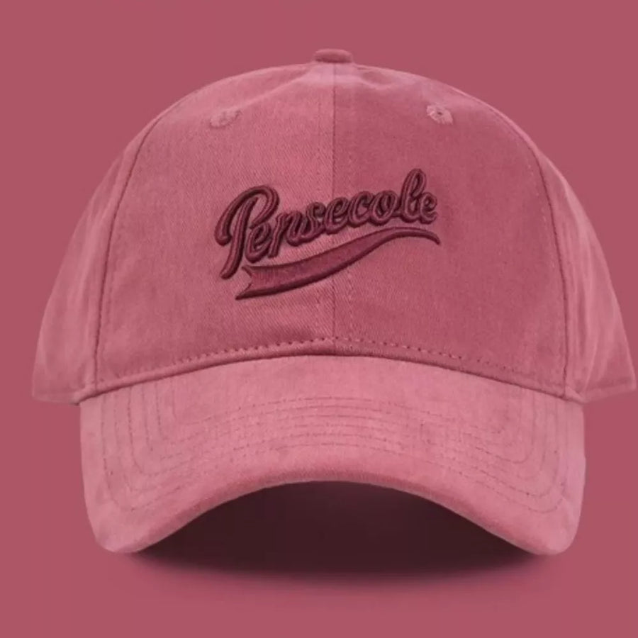 Vintage washed cotton baseball cap in Raspberry Powder with embroidered text