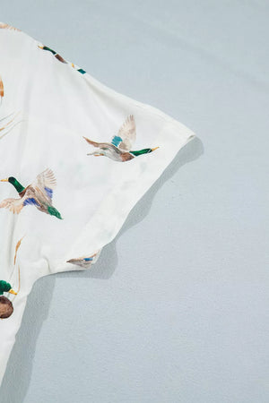 cream button-up shirt