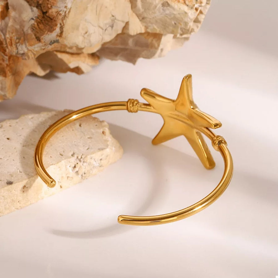 bracelet featuring starfish motif in Gold with 18K Gold-Plated, Stainless Steel Care instructions: Avoid wearing during