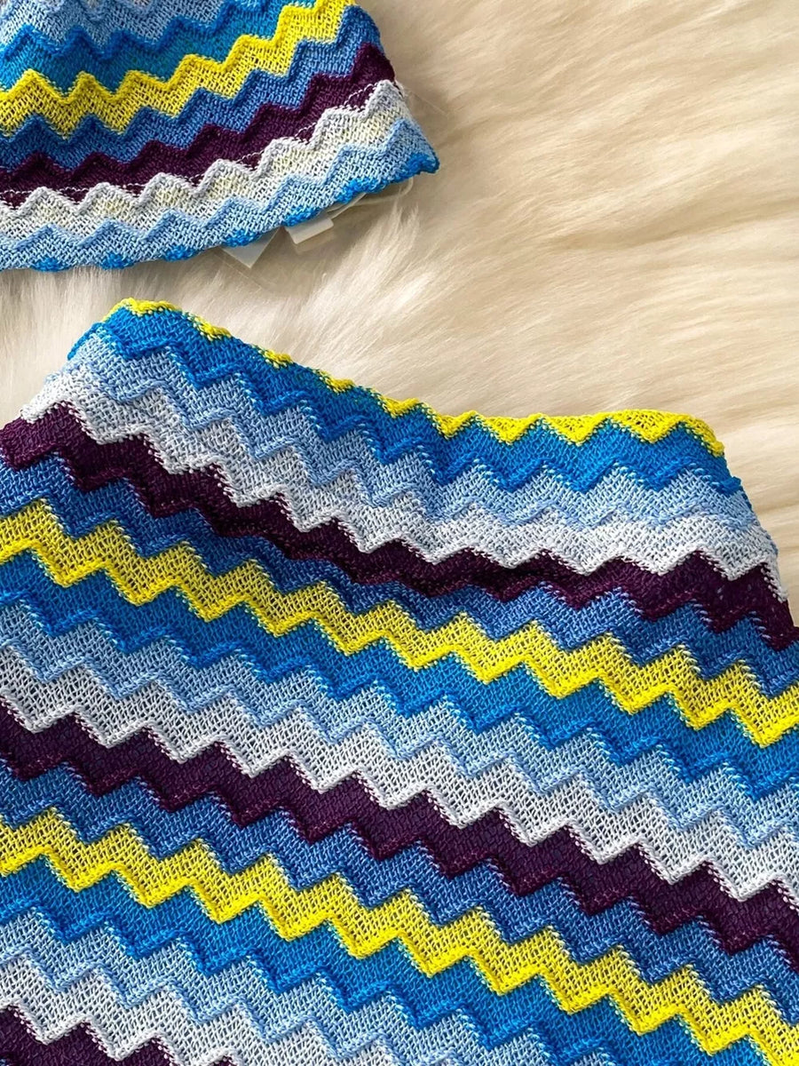Chevron knit halter crop top and maxi skirt set in blue, yellow, and purple zigzag pattern.