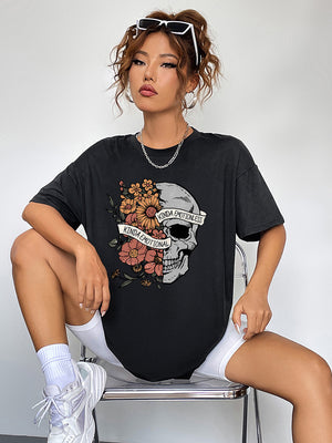 Black oversized tee with skull and floral graphic, "Kinda Emotional" text