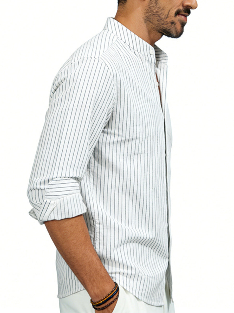 Men's white cotton blend long sleeve shirt with subtle pinstripes and buttoned collar.