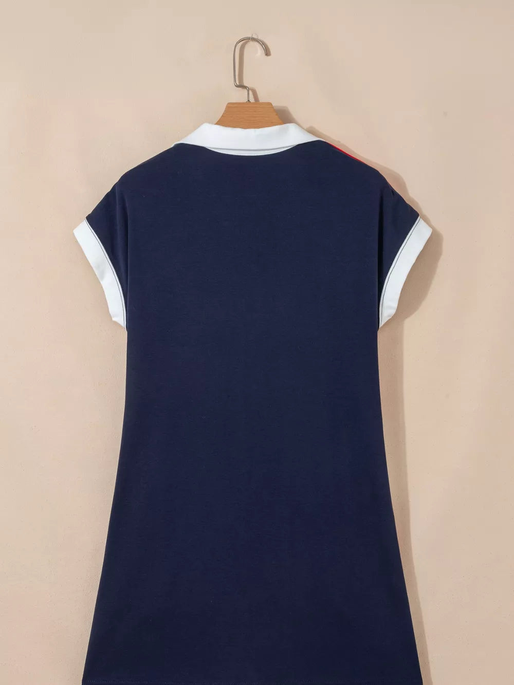 Americana colorblock mini dress with white collar and sleeve trim, dark navy.