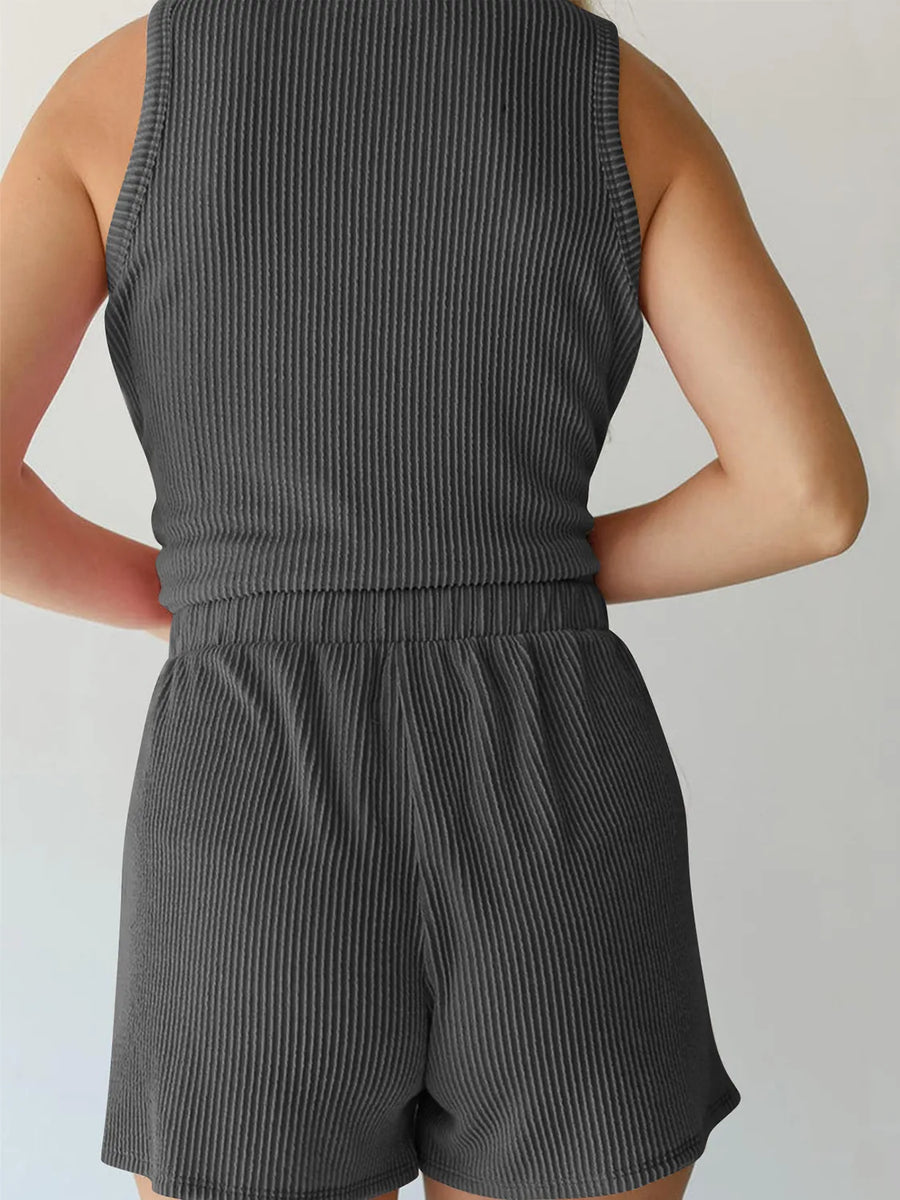 Dark gray ribbed sleeveless coord set with elastic waist shorts.