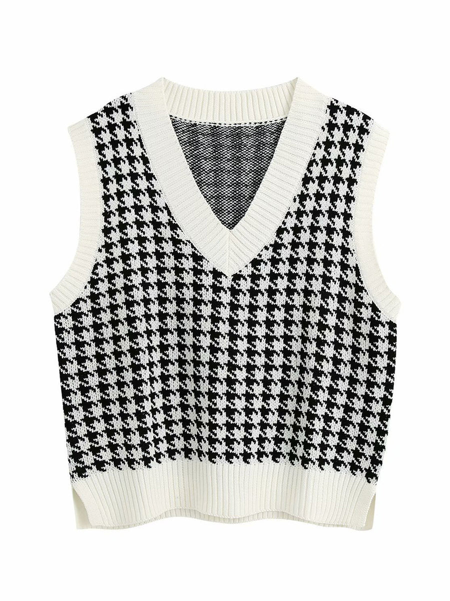 Houndstooth knit v-neck tank top in black and white with white trim.