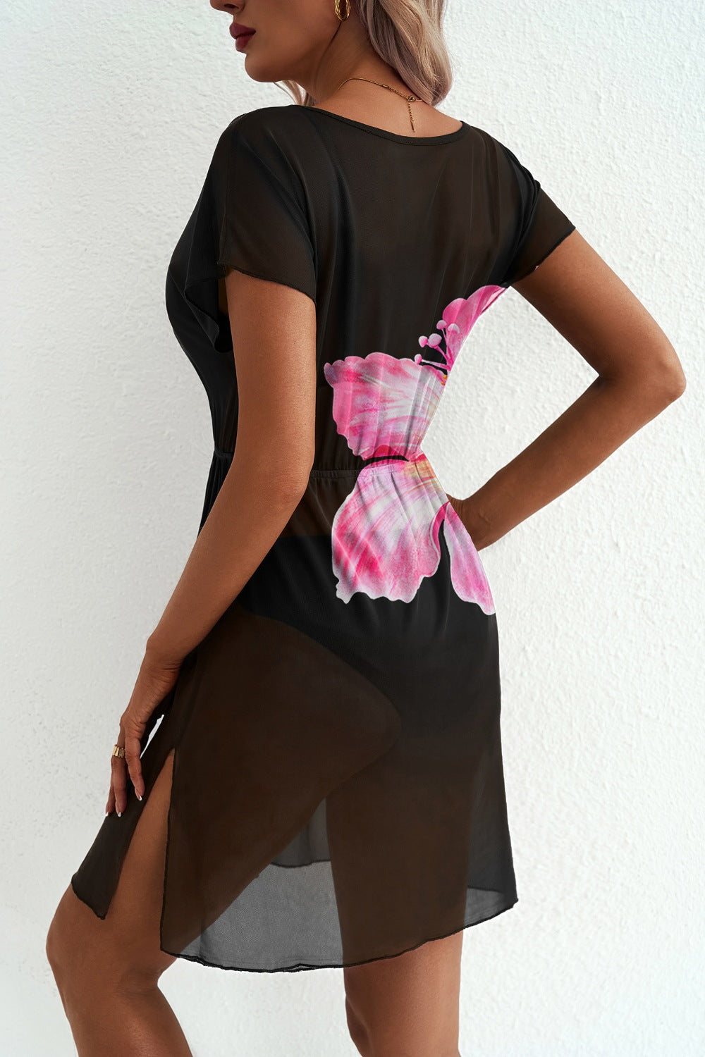 Black sheer floral V-neck beach cover-up with side slits and short sleeves.