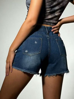 Dark blue distressed denim shorts with frayed hem and high waist.