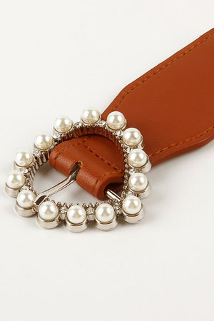 Caramel stretch belt with pearl and rhinestone heart buckle detail