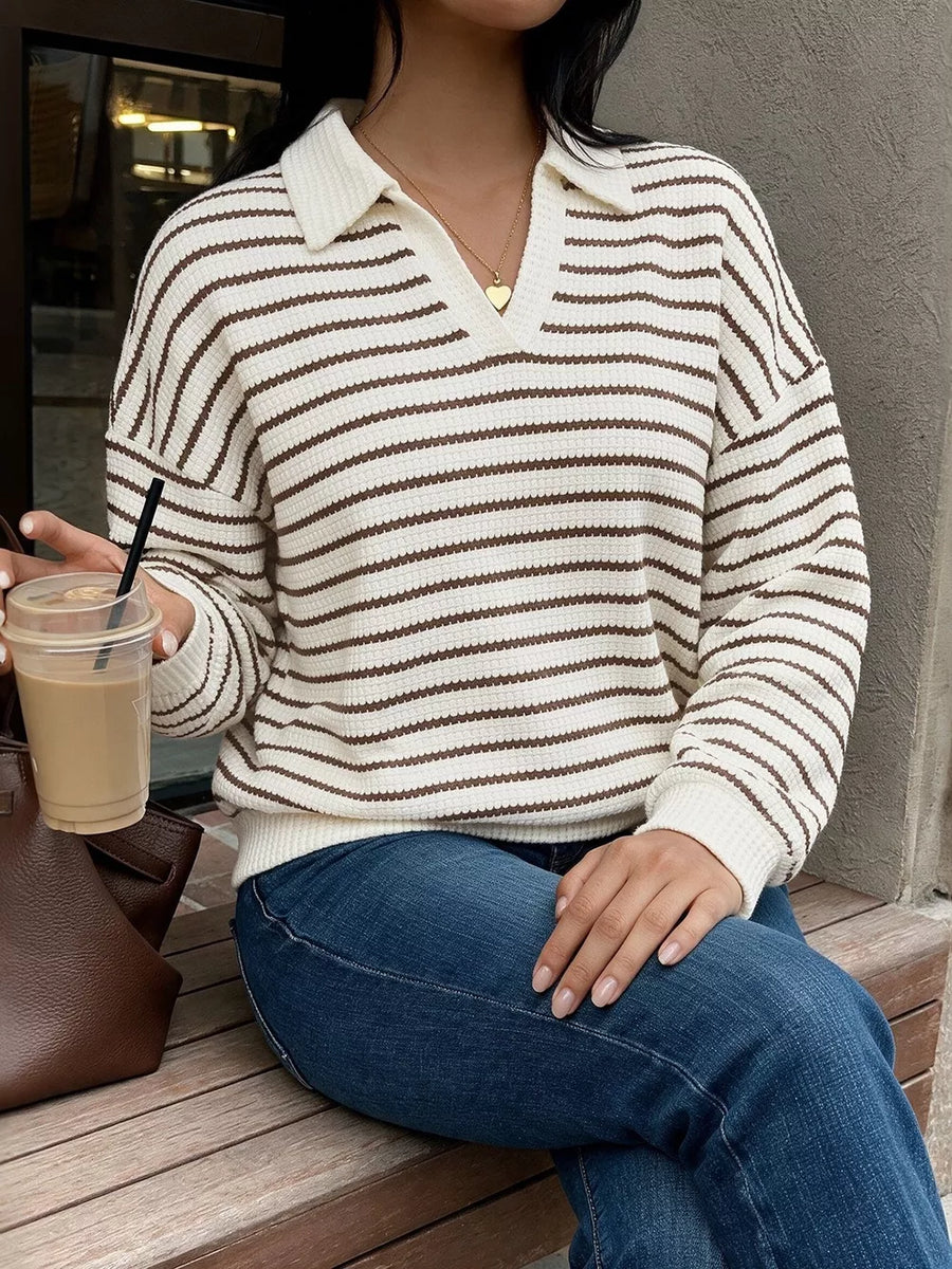 95% polyester, 5% elastane Care instructions: Machine wash cold pullover sweater in Coffee Brown with relaxed silhouette