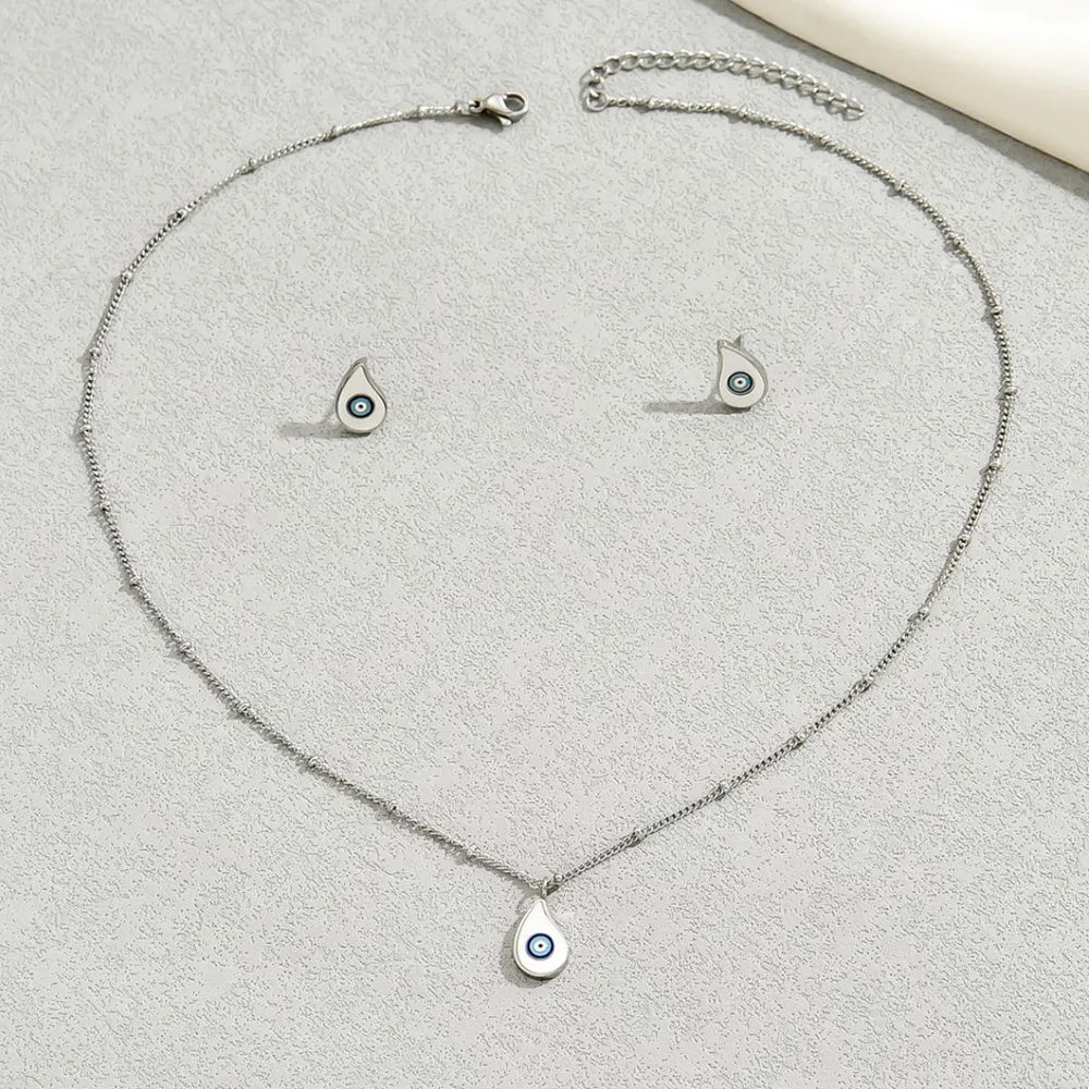 jewelry set in royal blue with evil eye motif and evil eye charm