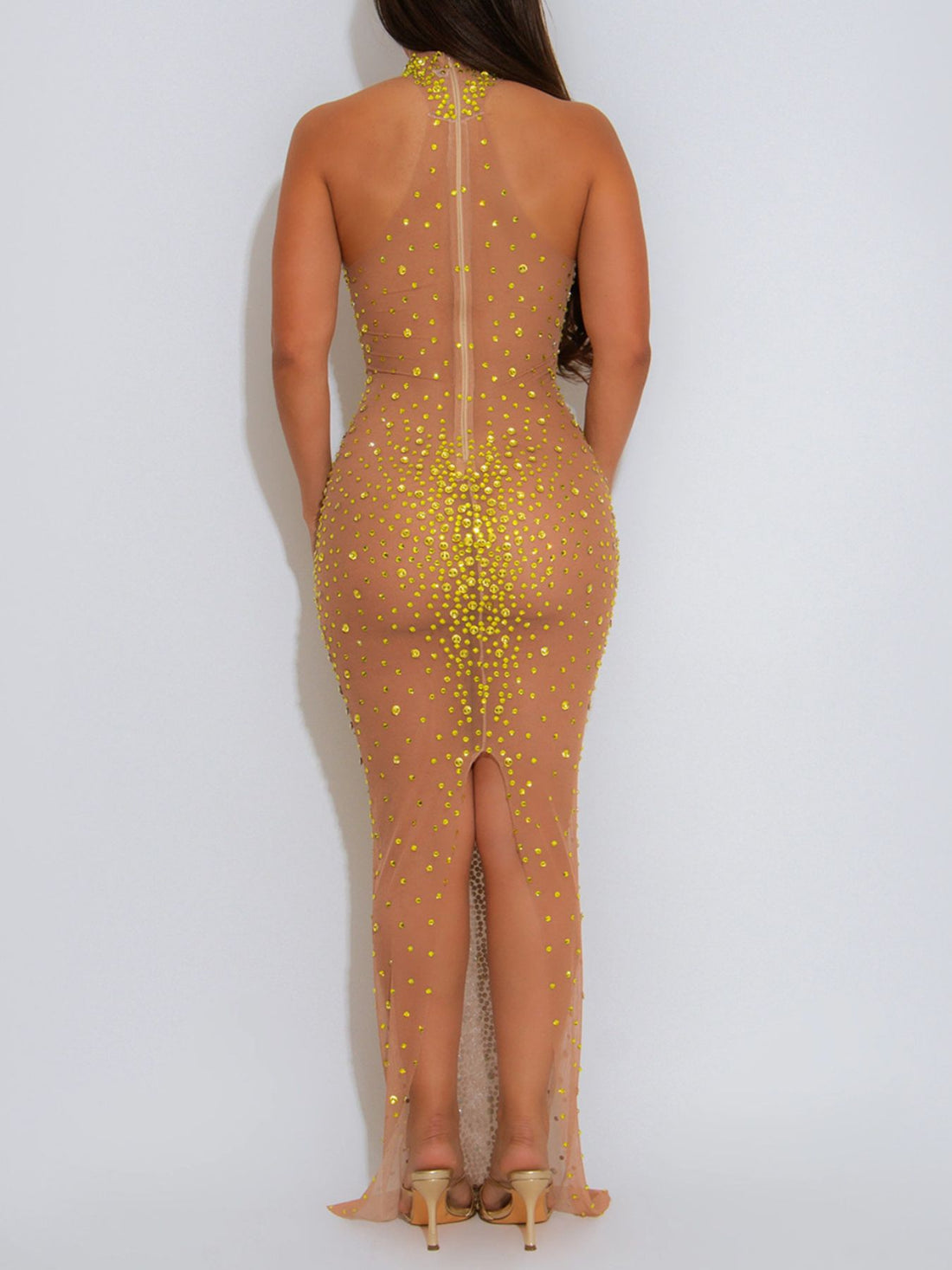 100% polyester Care instructions: Machine wash cold formal gown in nude with bodycon silhouette