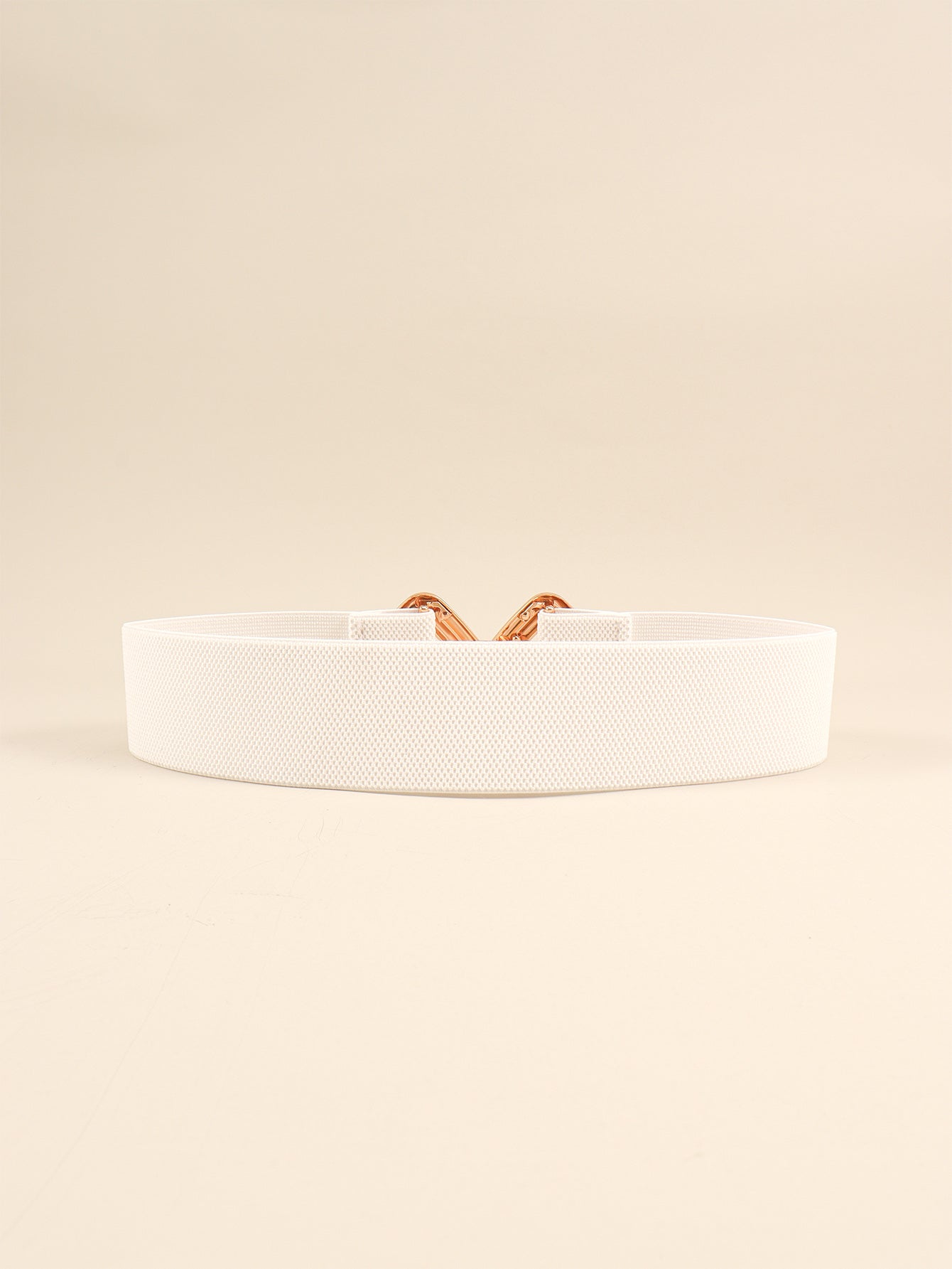 White elasticated waist belt with geometric gold buckle detail