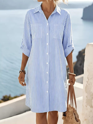 white shirt dress featuring buttoned and striped