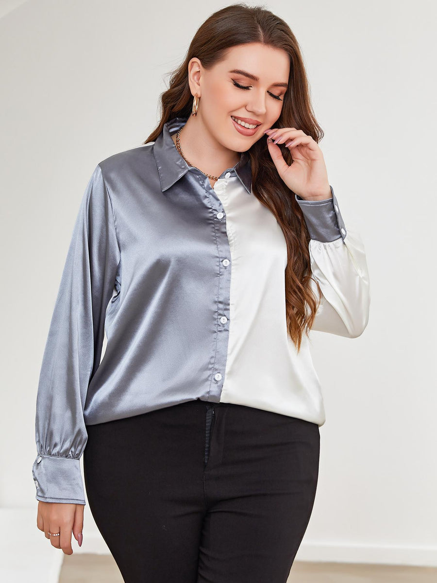 Satin split-tone button-down blouse in light blue and white with button cuffs.