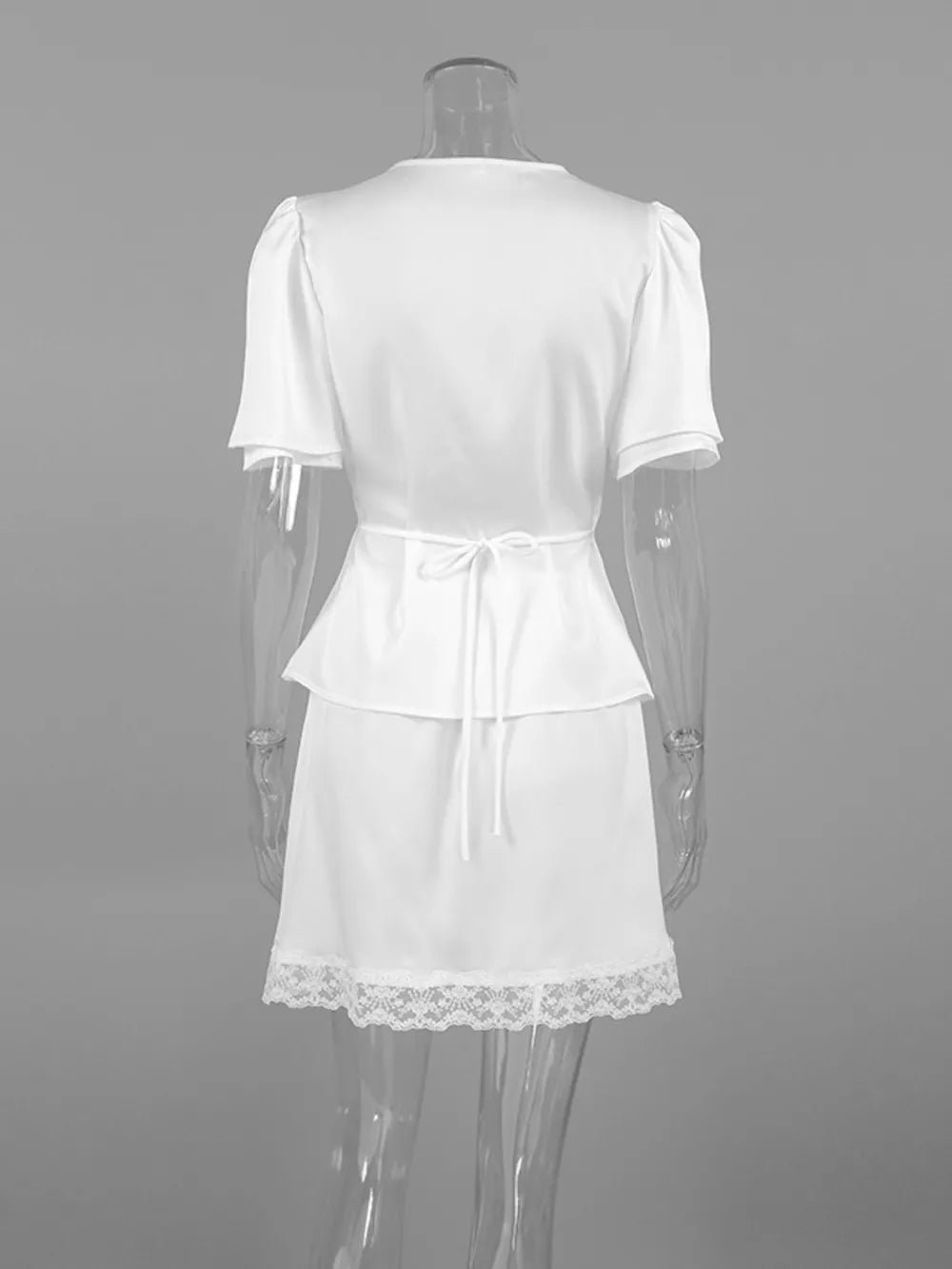 White mini dress with tie-front and short sleeve