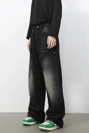 Faded wash wide-leg carpenter jeans in dark, with contrast stitching and utility pockets.